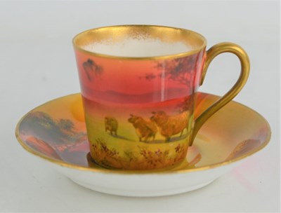 Lot 215 - A Royal Doulton coffee cup and saucer, sheep...