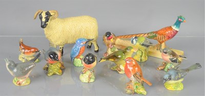 Lot 213 - A group of Beswick animal figures to include a...