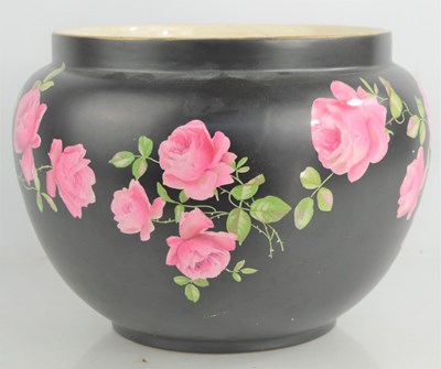 Lot 196 - A Crown Ducal jardinière decorated with pink...