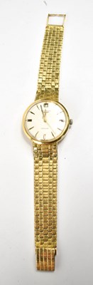 Lot 264 - An 18ct gold Longines wristwatch, the dial...