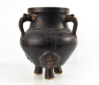 Lot 420 - A rare Chinese stoneware three handled jar /...