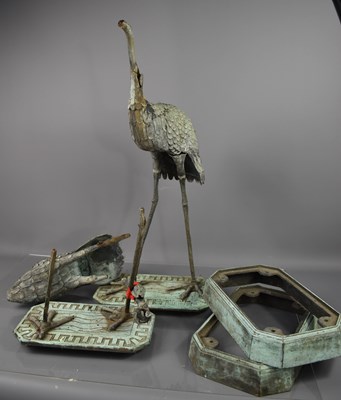 Lot 498 - A pair of cast metal garden cranes, green...