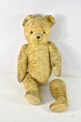 Lot 405 - A vintage excelsior filled teddy bear, the...