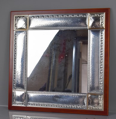 Lot 306 - A white metal Italian mirror, with hammered...