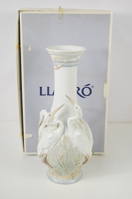 Lot 246 - A Lladro vase modelled with three herons to...