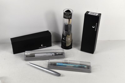 Lot 48 - A group of four Parker pens together with a...