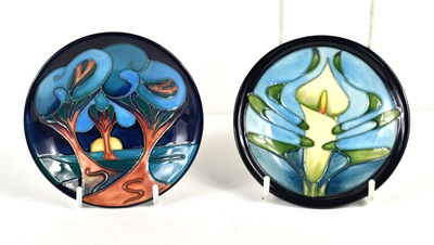 Lot 167 - Two Moorcroft pin dishes, Calla design by Emma...