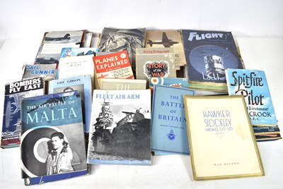 Lot 427 - A collection of military related books to...
