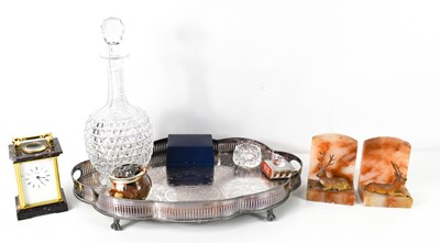 Lot 46 - A pair of agate book ends, bearing painted...