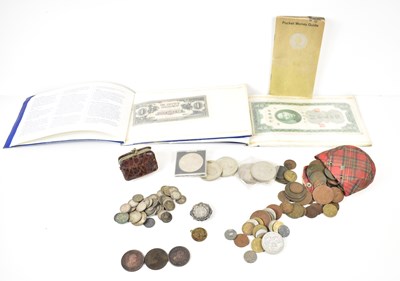 Lot 69 - A group of coins to include copper pennies,...