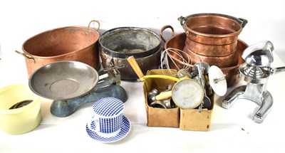 Lot 442 - A group of copper wares comprising a two pans...