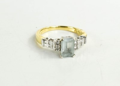 Lot 195 - An 18ct gold, aquamarine and diamond ring, the...