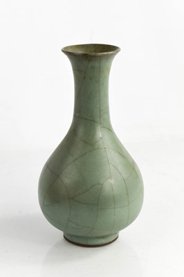 Lot 413 - A Chinese celadon glazed bottle vase, A/F.