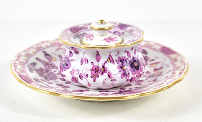 Lot 231 - A Meissen lidded pot and saucer, decorated in...