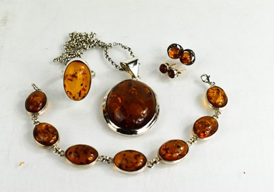 Lot 28 - A set of silver and amber jewellery comprising...