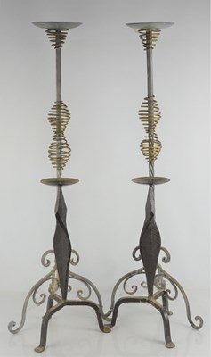 Lot 252 - Two pairs of steel and wrought iron candle...