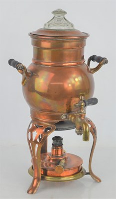Lot 499 - An early 20th century copper and brass coffee...
