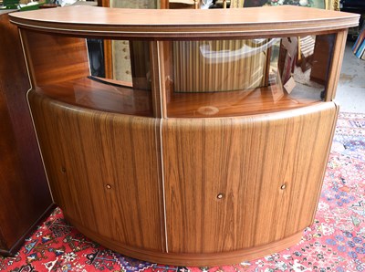 Lot 474 - A retro 1970s semi circular bar, with glass...