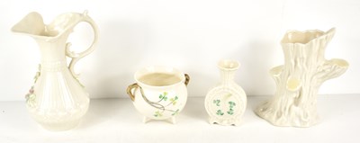 Lot 171 - A group of Belleek porcelain to include a vase...