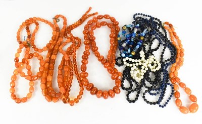 Lot 53 - A butterscotch amber beaded necklace with 9ct...