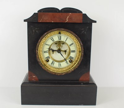 Lot 275 - A Victorian slate mantle clock having an...