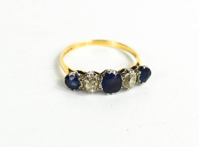 Lot 250 - An 18ct gold, diamond and sapphire ring, with...