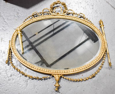 Lot 385 - A 19th century oval giltwood mirror, with two...