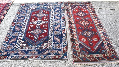 Lot 500 - A Middle Eastern wool rug and runner, blue and...