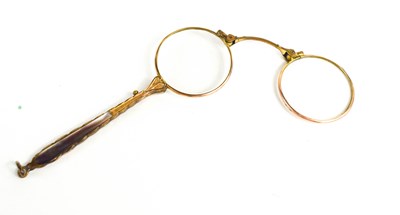 Lot 121 - A pair of Edwardian gilt metal folding...