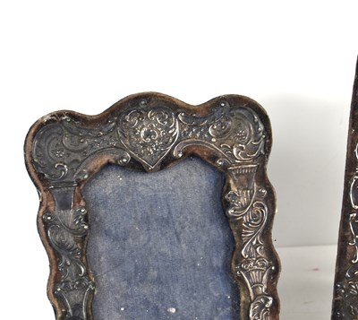 Lot 27 - An Edwardian silver ornate photo frame with...