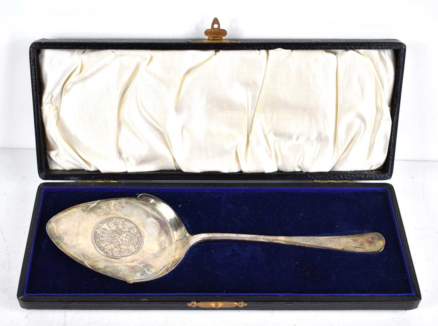 Lot 28 - A silver commemorative cake slice set with a...