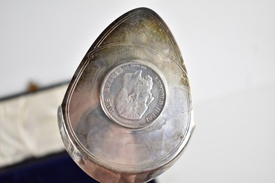Lot 28 - A silver commemorative cake slice set with a...