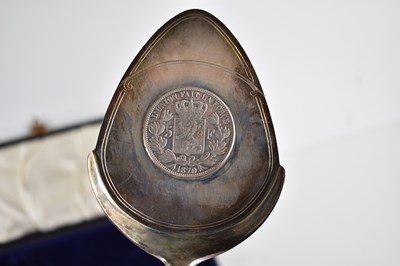 Lot 28 - A silver commemorative cake slice set with a...