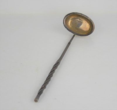 Lot 393 - A 19th century white metal toddy ladle baleen...