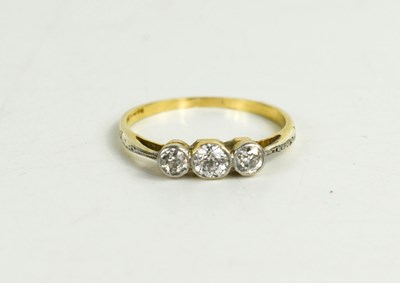 Lot 319 - An 18ct gold and diamond three stone ring, old...