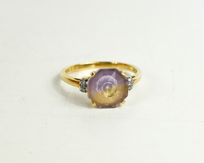 Lot 160 - A 9ct gold and ametrine ring, in four claw...