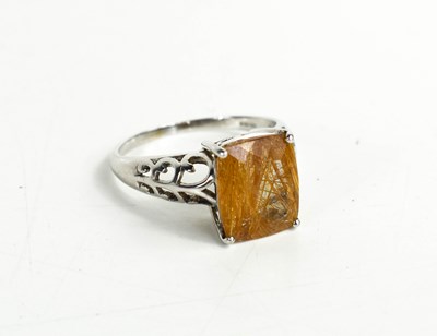Lot 253 - A 9ct white gold and quartz hair stone ring,...