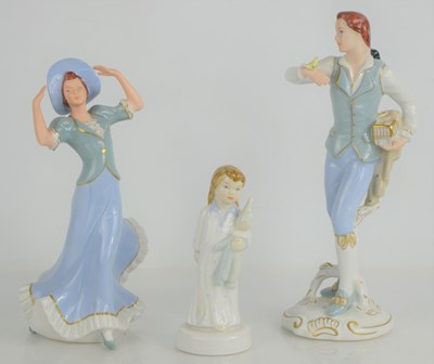 Lot 223 - Three Royal Dux figurines to include elegant...