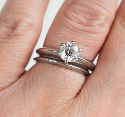 Lot 275 - A Tiffany & Co platinum and diamond solitaire...