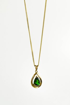 Lot 109 - A 9ct gold and green topaz set pendant...
