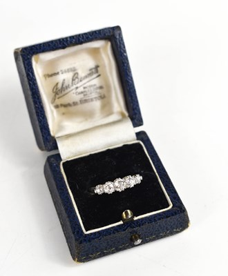 Lot 65 - A platinum diamond five stone ring, the...
