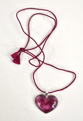 Lot 120 - A Lalique heart-shaped pendant suspended from...