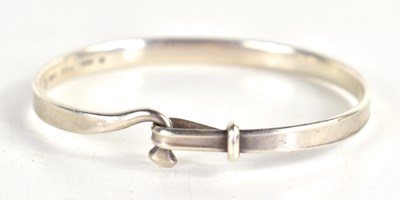 Lot 152 - Georg Jensen. A sterling silver bangle,...