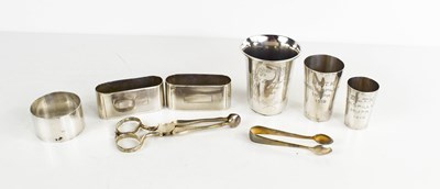 Lot 138 - A selection of silver to include a pair of...