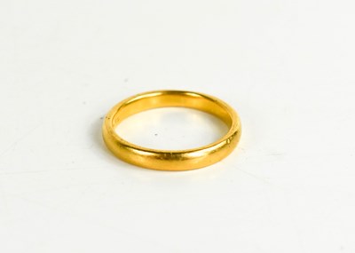 Lot 213 - A 22ct gold wedding band, size R, 5.57g.