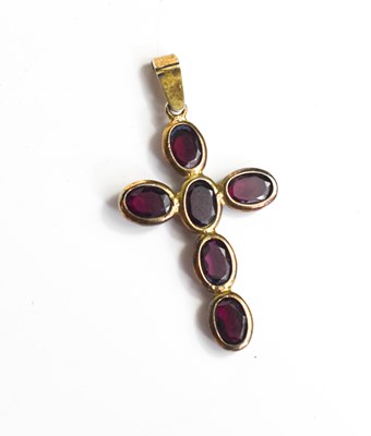 Lot 139 - A gold and garnet set cruciform pendant,...