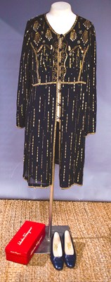 Lot 209 - A Caroline Charles black embroidered tunic,...