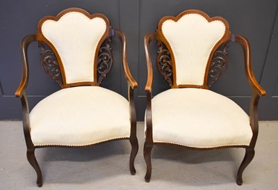 Lot 539 - A pair of mahogany salon armchairs upholstered...