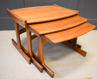 Lot 592 - A Mid-Century G-Plan teak nest of three tables