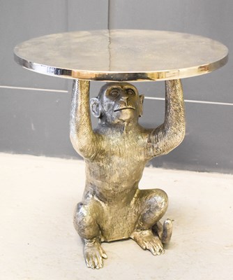 Lot 587 - A contemporary nickel plated coffee table in...